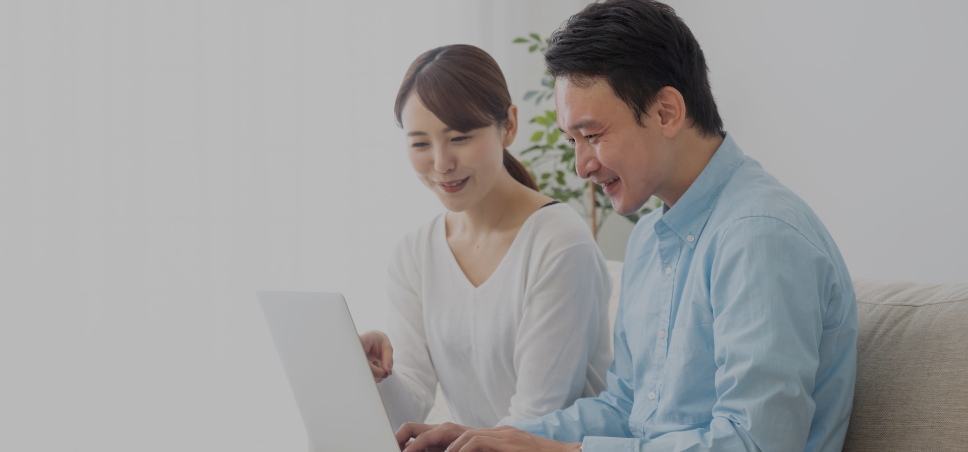 Couple Looking at Computer